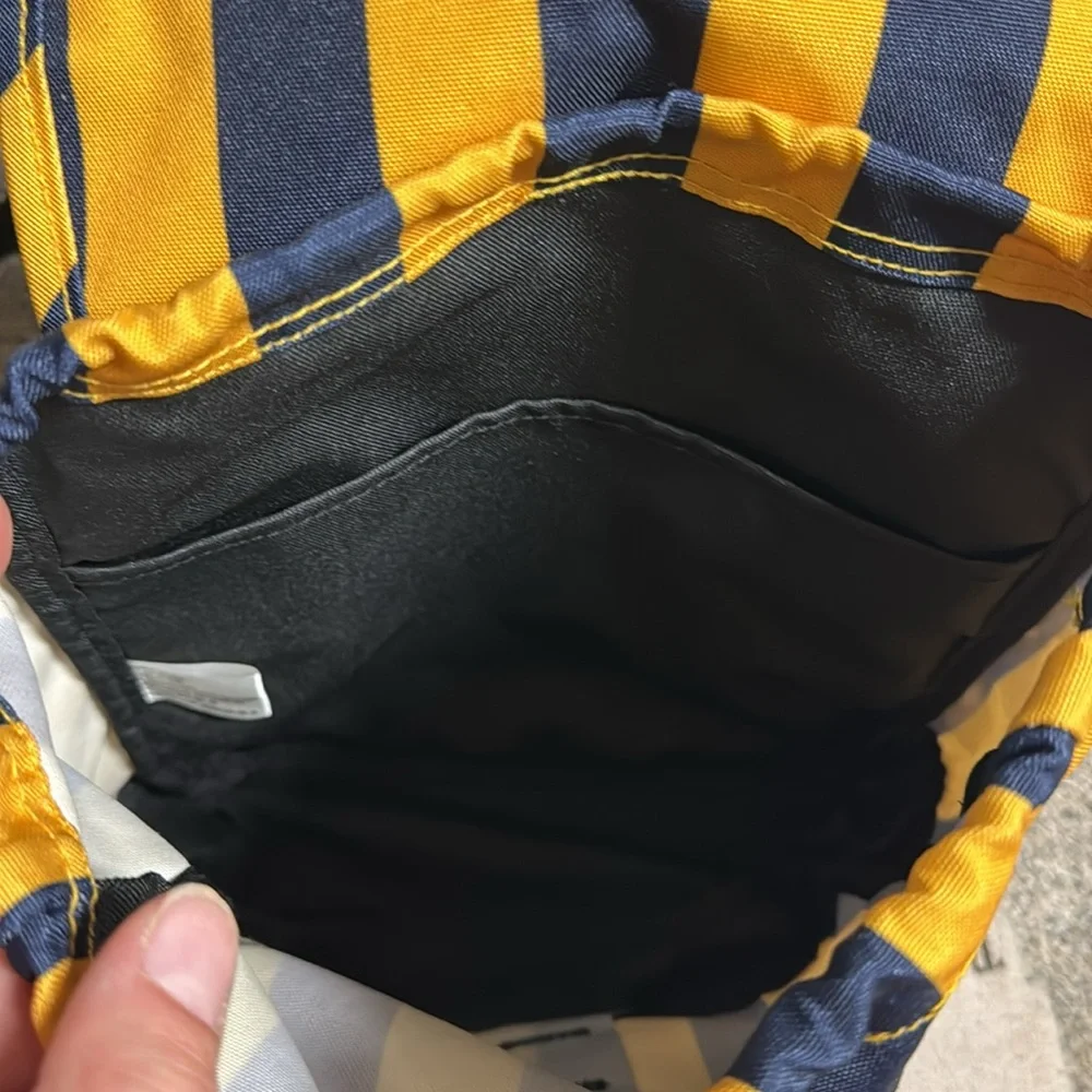 Like New PINK mini backpack navy/yellow stripe drawstring and buckle closure